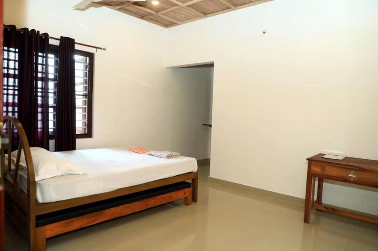The Munroe Vibes Inn Mundrothuruth ภายนอก รูปภาพ