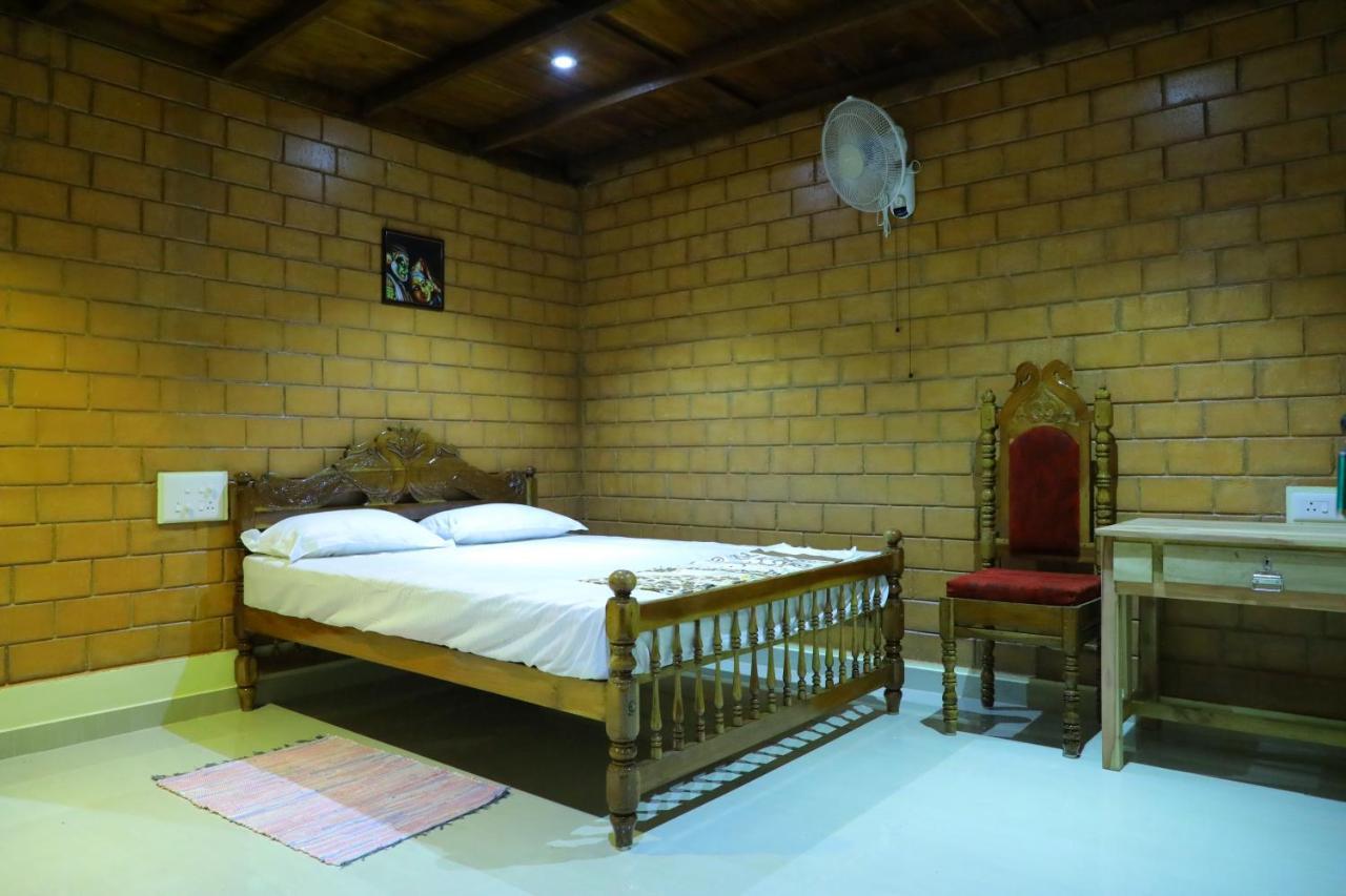 The Munroe Vibes Inn Mundrothuruth ภายนอก รูปภาพ