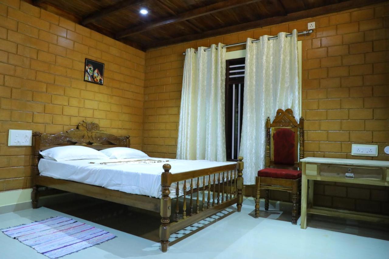The Munroe Vibes Inn Mundrothuruth ภายนอก รูปภาพ